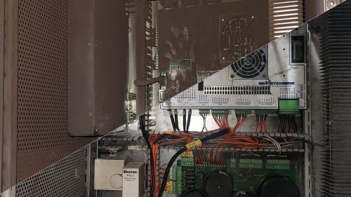 Smoke-damaged computer before and after restoration following a fire