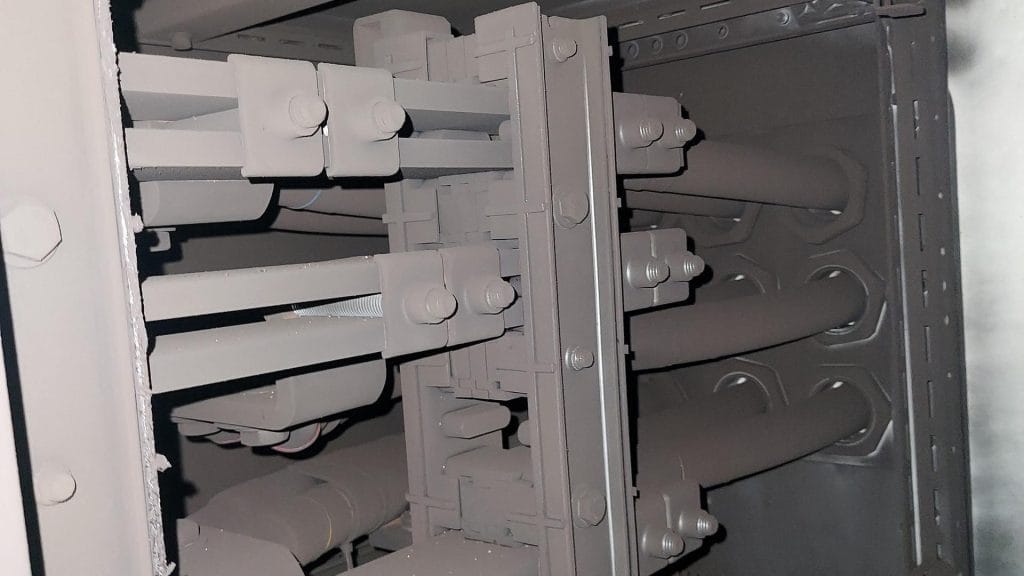 Sooty control cabinet before renovation after a fire