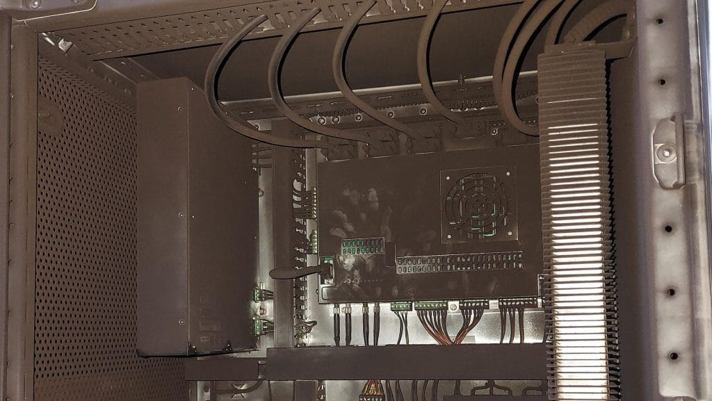 Sooty control cabinet before renovation after a fire